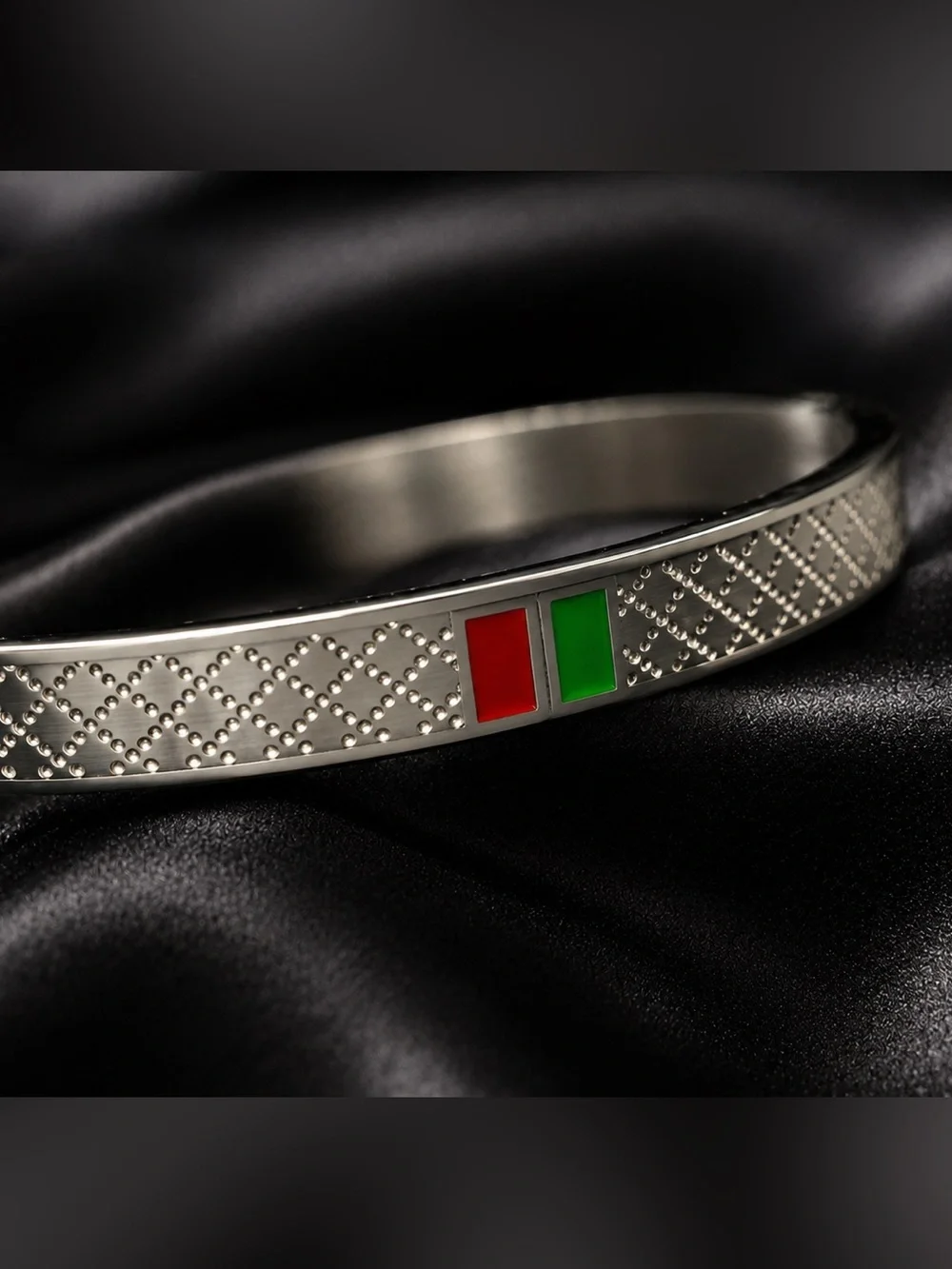 Luxury Silver Bangle Bracelet with Red and Green Accents